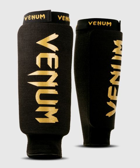 Venum Schiienbeinschutz Kontakt ohne Fuß - Schwarz/Gold